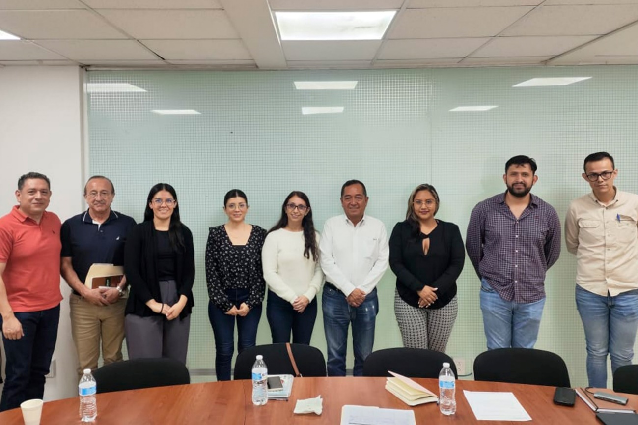 Grupo de personas en una oficina El contenido generado por IA puede ser incorrecto.