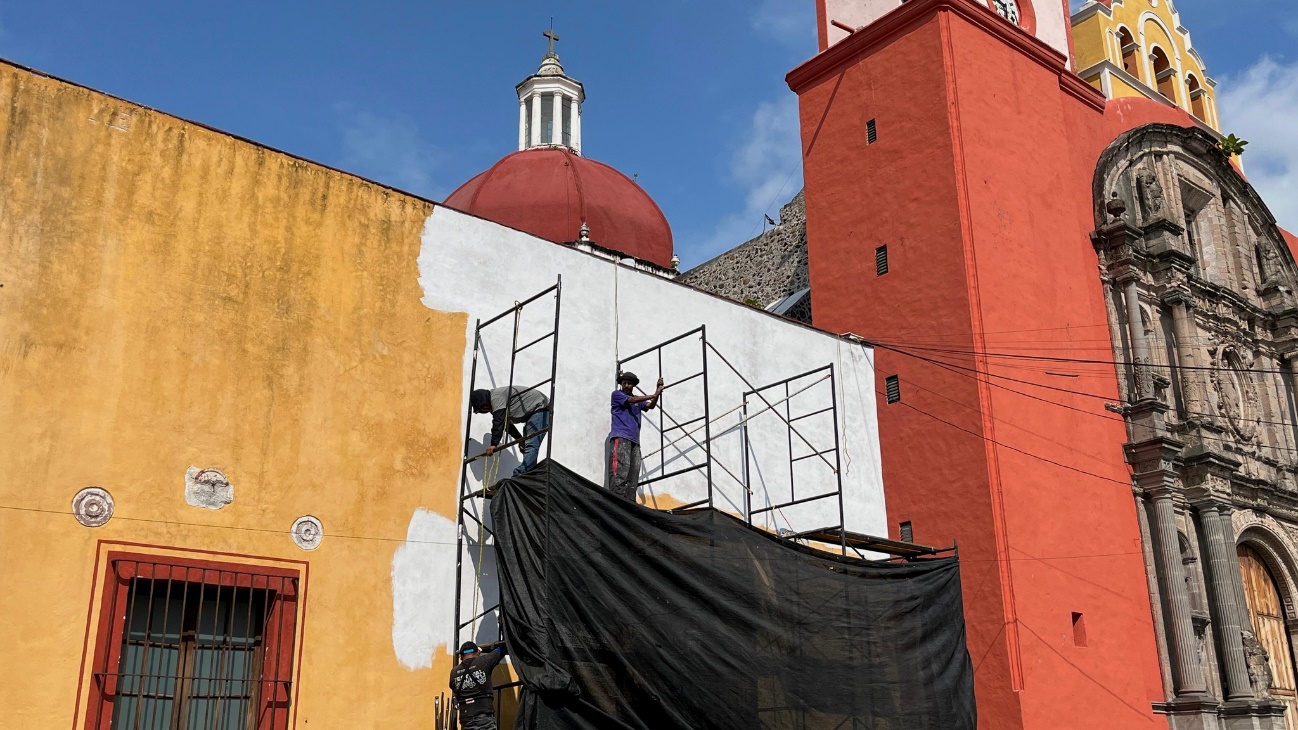 Una torre de un edificio de ladrillo El contenido generado por IA puede ser incorrecto.